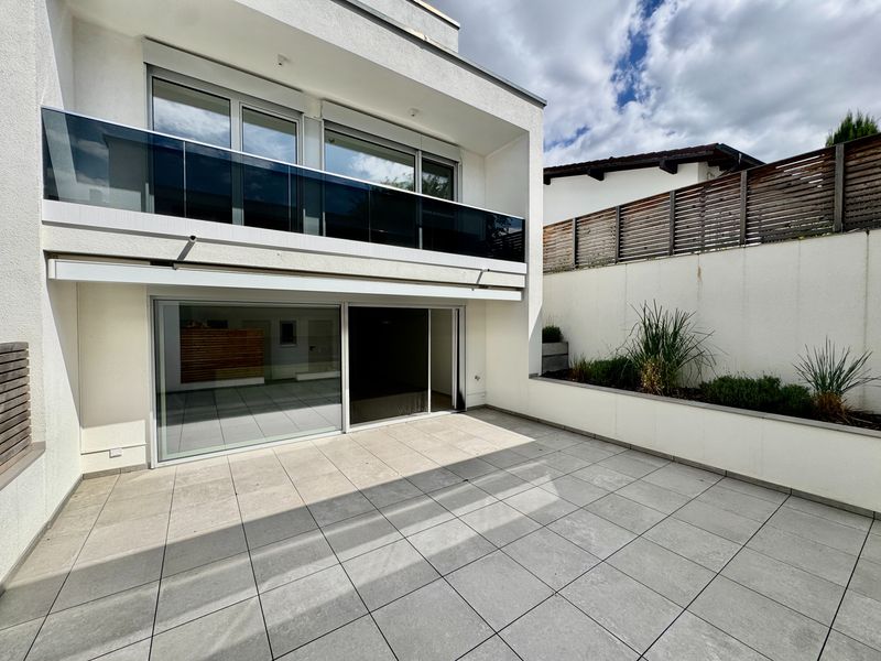 Haus-in-Haus-Konzept mit großer Terrasse und hochwertiger Ausstattung